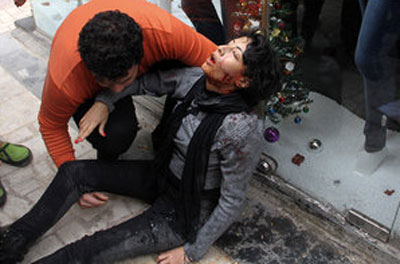 Imagem do assassinato de Shaimaa al Sabbagh a 24 de Janeiro por polícias de choque mascarados